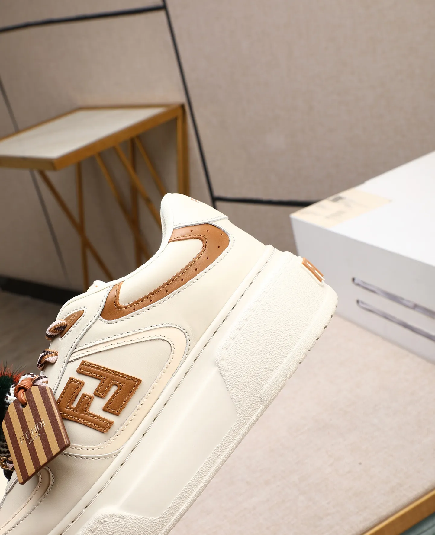 Men's shoes 💰740 Top quality Fendi Match series 25 latest colors Pendant thick sole lace casual FENDI Match lace. Made of light pink leather with white and ocher brown details. Contrast leather FF appliqué on the sides and hiking laces in white, pink and ocher brown. Thick rubber sole with oversized embossed FENDI lettering on the heel. Metal ring charm on the tongue: A small braided doll with contrasting mink fur details and gold metallic FF on the right shoe. The left shoe features a braided cord with contrasting mink double pom poms, metallic FF beads, and Pequin print pattern and logo. Upper: Original custom-made imported first-layer cowhide. Inner lining: Imported custom-made breathable mesh lining. Sole: Original open-molded ultra-light foam material. Bottom thickness: 5CM. Number of yards: women's 35-40 (custom-made 40 non-refundable).